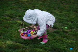 little girl easter egg hunting