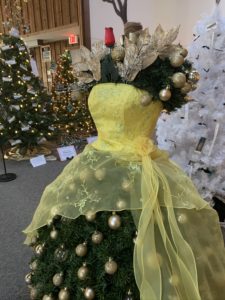 christmas tree decorated as belle from beauty and the beast